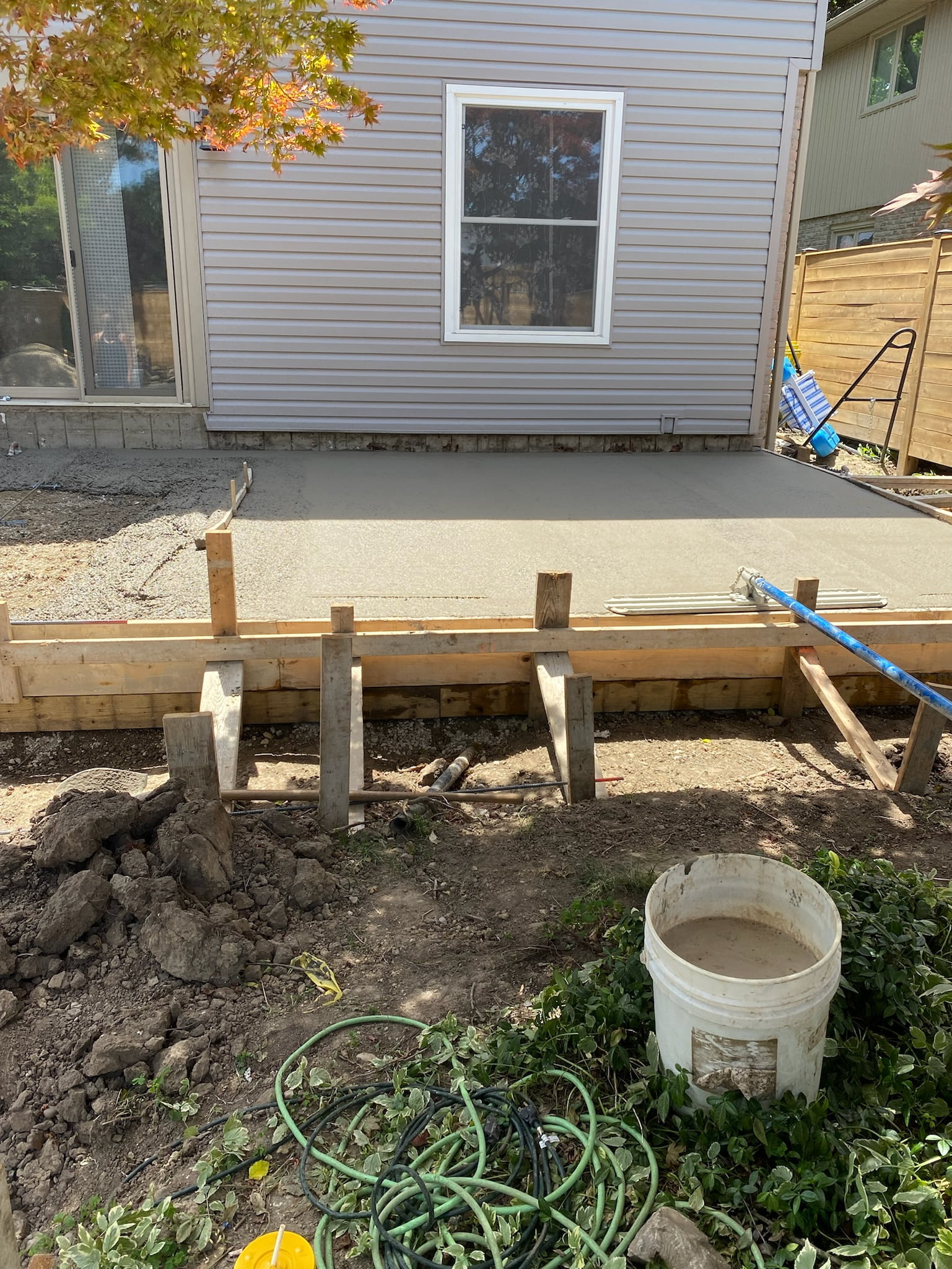freshly poured concrete patio setting