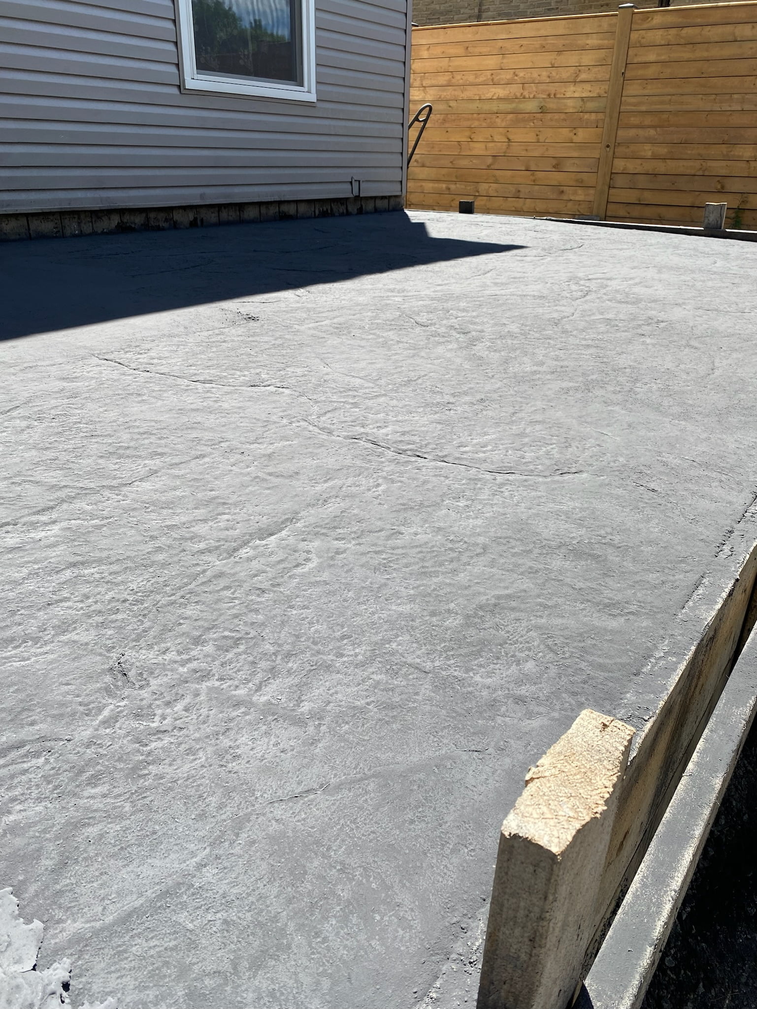 freshly stamped custom concrete patio