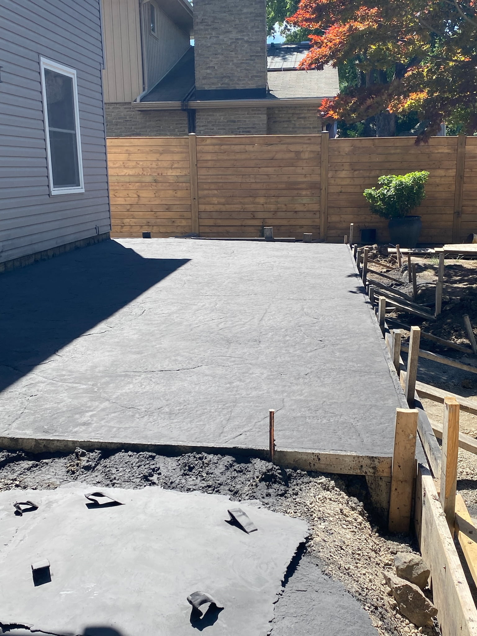 freshly stamped custom concrete patio
