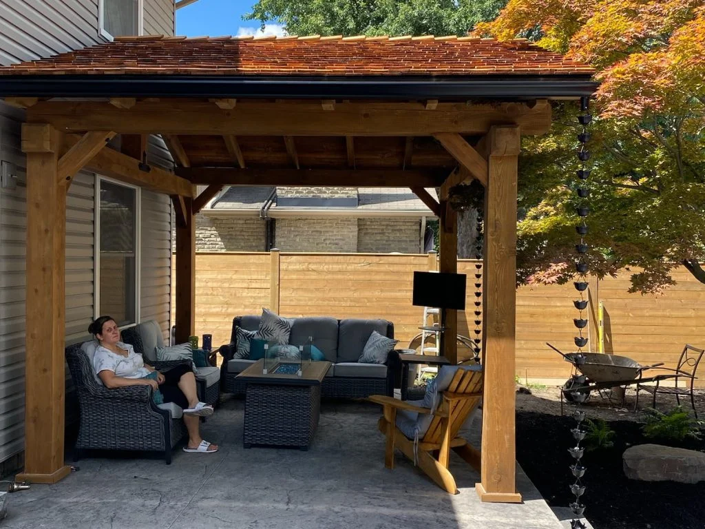 wooden shade structure on concrete deck