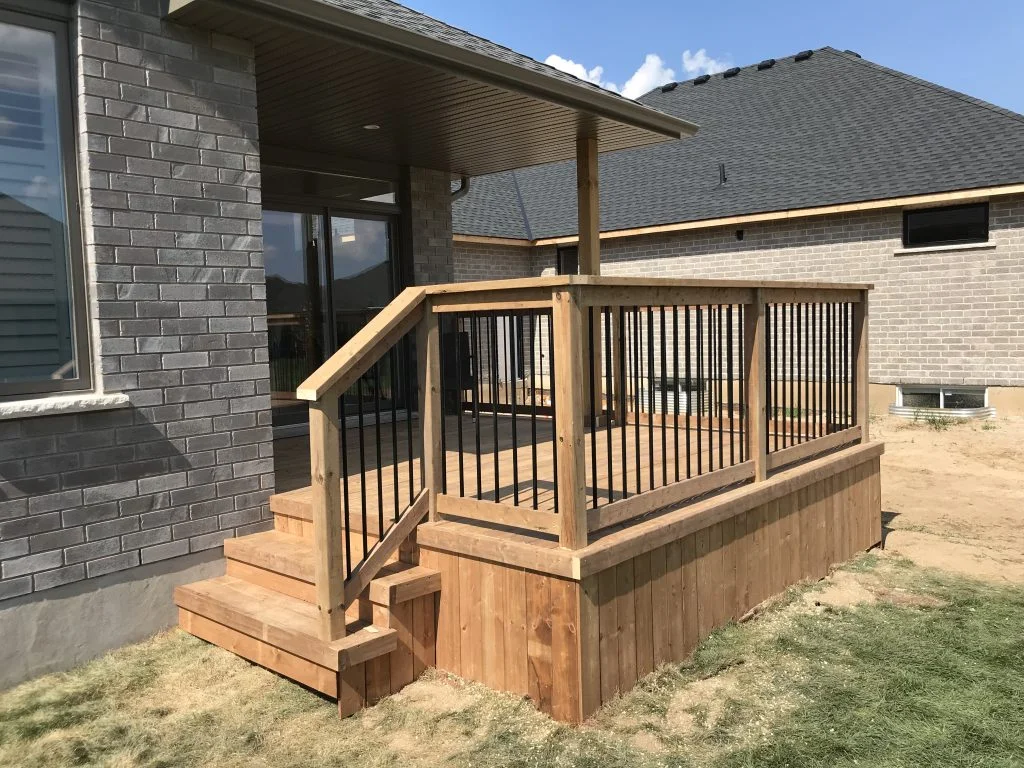 small covered deck on back of condo