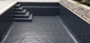 black pool liner under construction