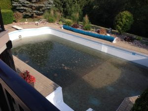 swimming pool after opening in the spring discovering winter water loss